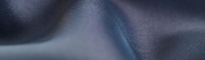 Satin bed sheet material.