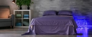 A hybrid spring memory foam mattress set up in a bedroom.