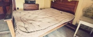 An old mattress causing back pain.
