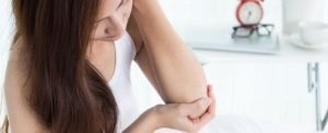Woman With Tennis Elbow.