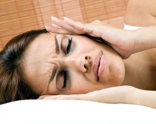 Woman Trying to Sleep With Ear Pain.